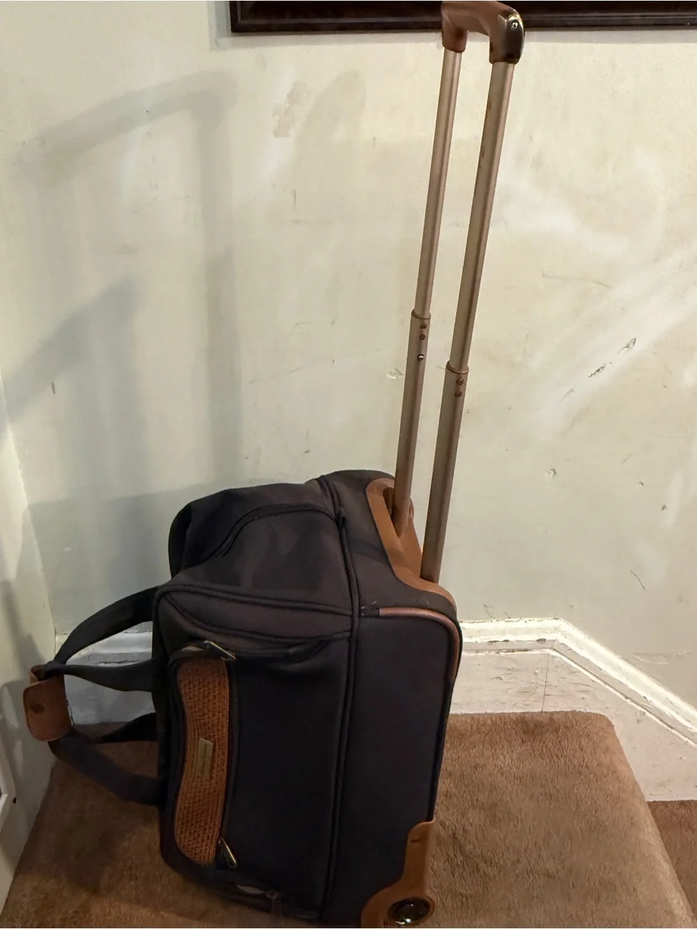 Tommy Bahama Dark Brown and Tan Rolling Travel Duffel